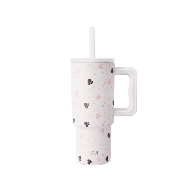 Stainless steel tumbler with handle in cream and soft pink colors Stainless steel tumbler with handle in cream and soft pink colors
