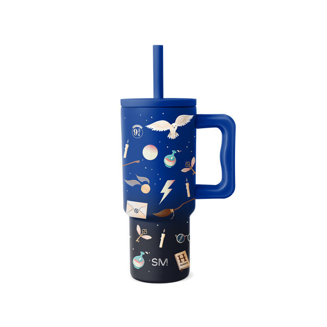 Cobalt blue and charcoal black two-tone tumbler with integrated handle and straw, upper portion blue, lower portion black. Cobalt blue and charcoal black two-tone tumbler with integrated handle and straw, upper portion blue, lower portion black.