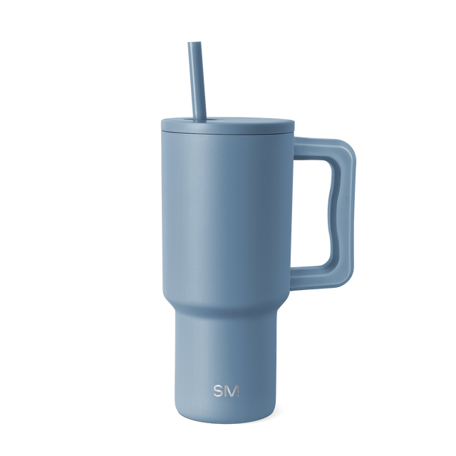 Soft blue-gray ceramic tumbler on white background, featuring a muted slate tone with cool undertones. Product shot for e-commerce display. Soft blue-gray ceramic tumbler on white background, featuring a muted slate tone with cool undertones. Product shot for e-commerce display.