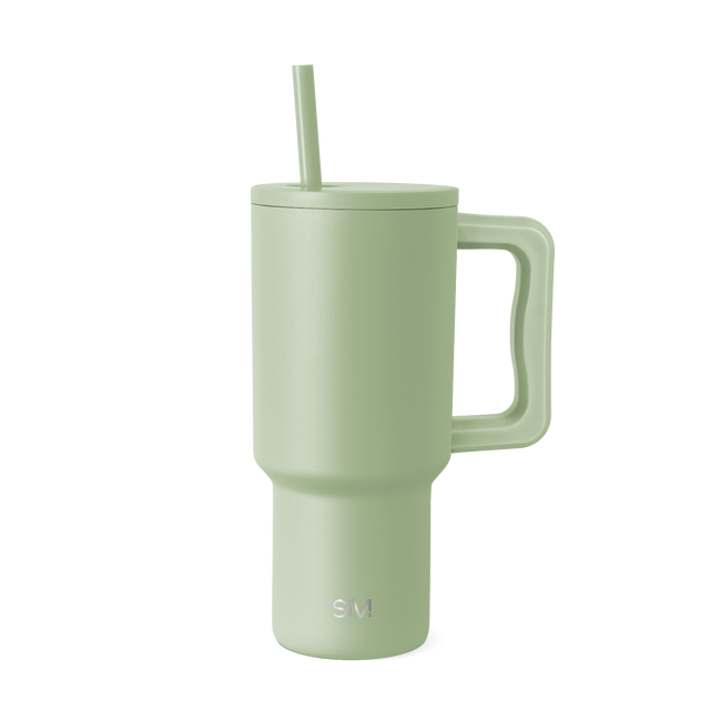 Matte sage green tumbler with soft, muted tone and subtle sheen variations Matte sage green tumbler with soft, muted tone and subtle sheen variations