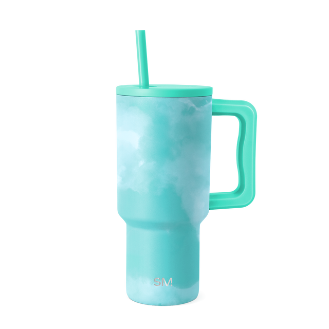 Pale turquoise tumbler with marbled tie-dye pattern in teal and seafoam tones, featuring watercolor-like transitions from light to dark areas. Pale turquoise tumbler with marbled tie-dye pattern in teal and seafoam tones, featuring watercolor-like transitions from light to dark areas.