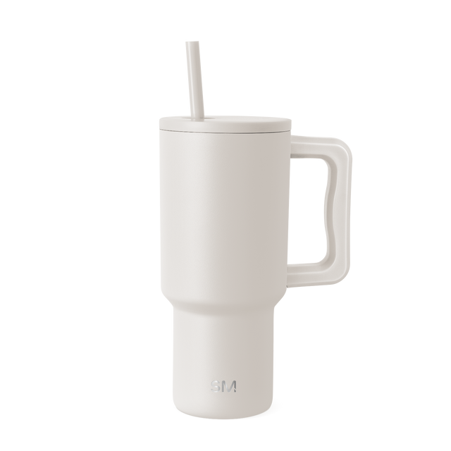 Cream-colored drinkware set displayed on a light gray-white background Cream-colored drinkware set displayed on a light gray-white background