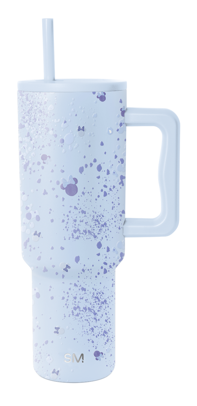 Soft lavender blue tumbler with scattered paint splatter and speckle details in darker shades across the surface. Soft lavender blue tumbler with scattered paint splatter and speckle details in darker shades across the surface.