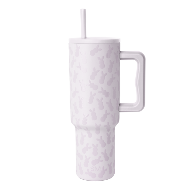 Pale lavender tumbler with white lid, straw, and handle Pale lavender tumbler with white lid, straw, and handle