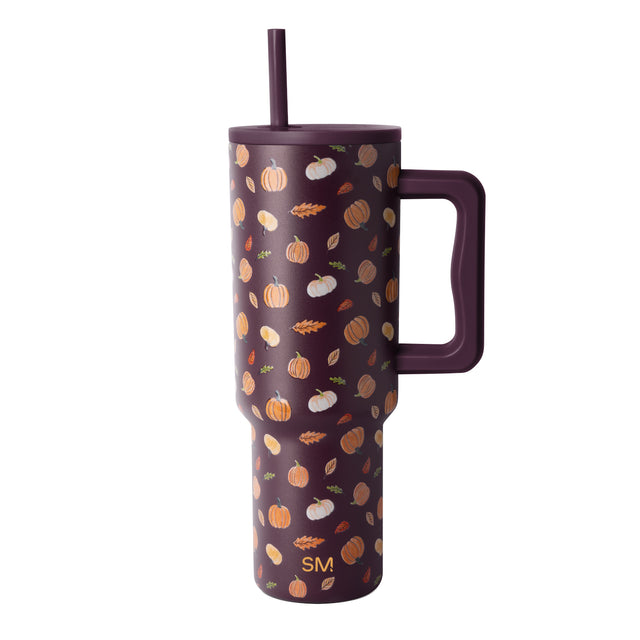 Deep burgundy autumn tumbler with warm golden accents, modern minimalist design Deep burgundy autumn tumbler with warm golden accents, modern minimalist design