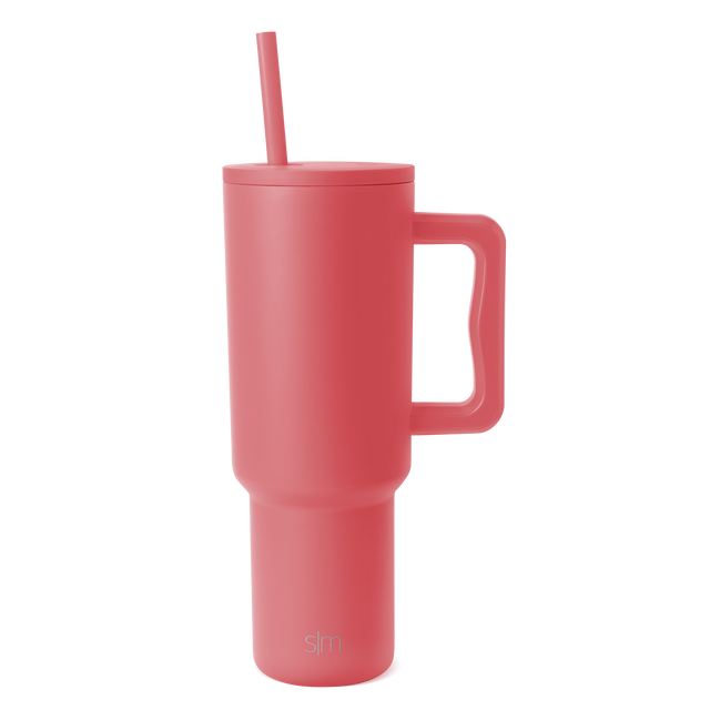 Dusty rose pink tumbler on white background Dusty rose pink tumbler on white background