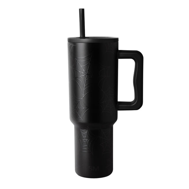 Matte black cylindrical tumbler with matching handle, lid, and straw against a white background. Matte black cylindrical tumbler with matching handle, lid, and straw against a white background.
