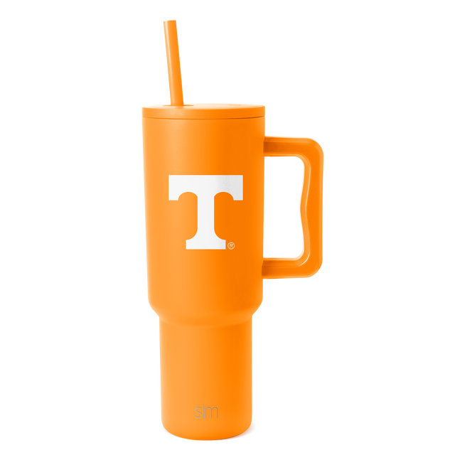 Bright orange insulated tumbler with cylindrical body, tapered base, and wide mouth opening against white background Bright orange insulated tumbler with cylindrical body, tapered base, and wide mouth opening against white background