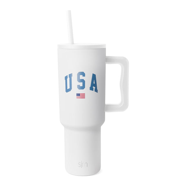 White insulated tumbler with blue USA flag graphic and text design White insulated tumbler with blue USA flag graphic and text design