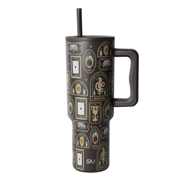 Dark gray tumbler with gold, cream, and tan vintage-inspired pattern overlay, luxe aesthetic design. Dark gray tumbler with gold, cream, and tan vintage-inspired pattern overlay, luxe aesthetic design.