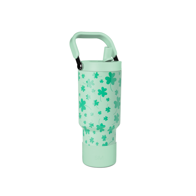 Soft mint green pen with four-leaf clover design in deeper green and teal shades on handle, cap, and base. Soft mint green pen with four-leaf clover design in deeper green and teal shades on handle, cap, and base.
