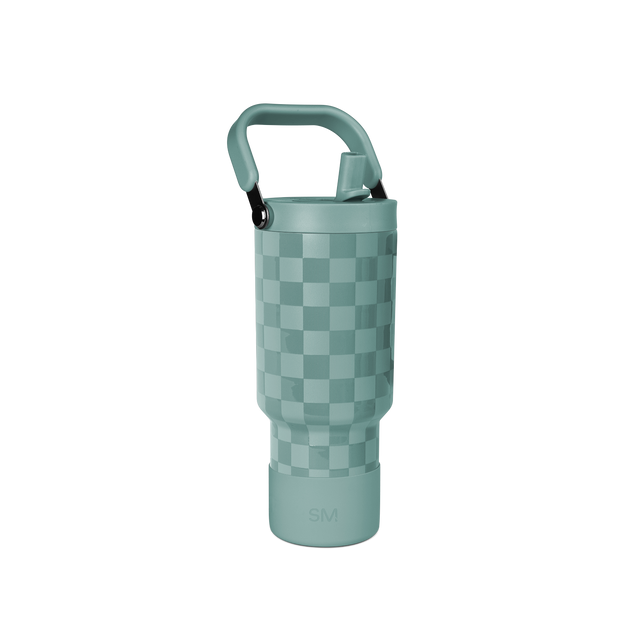 Sage green cylindrical container with checkerboard pattern in two tones of green, featuring matching handle and base Sage green cylindrical container with checkerboard pattern in two tones of green, featuring matching handle and base