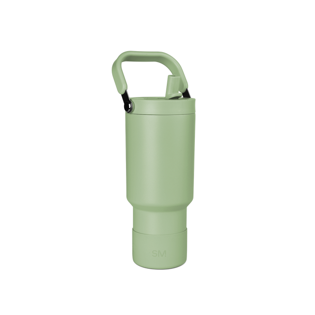 Soft sage green water bottle with handles and matching base on white background Soft sage green water bottle with handles and matching base on white background