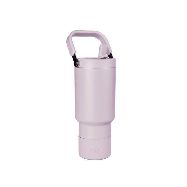 Lavender purple bottle with black carabiner attachment, product shot on neutral background Lavender purple bottle with black carabiner attachment, product shot on neutral background