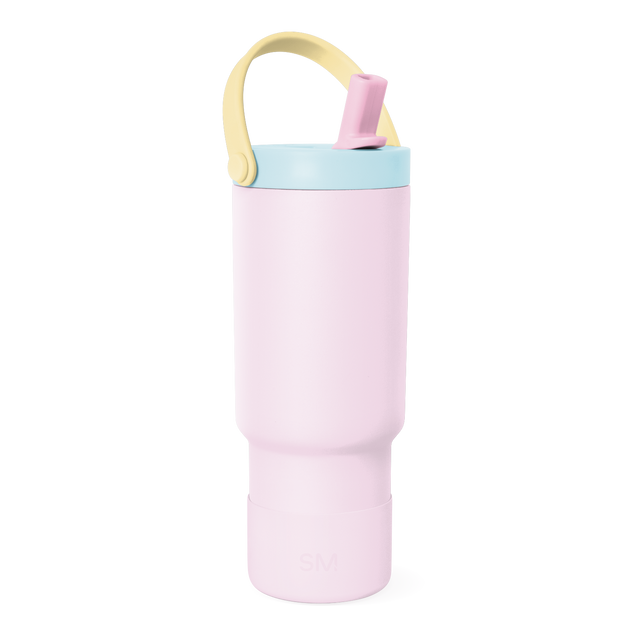 Light pink vessel with pale blue-green lid band and soft cream-colored handle arching over the top Light pink vessel with pale blue-green lid band and soft cream-colored handle arching over the top