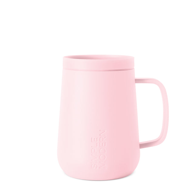 Pale pink ceramic mug on white background, viewed from front angle, featuring clean minimalist design suitable for everyday use or gifting. Pale pink ceramic mug on white background, viewed from front angle, featuring clean minimalist design suitable for everyday use or gifting.