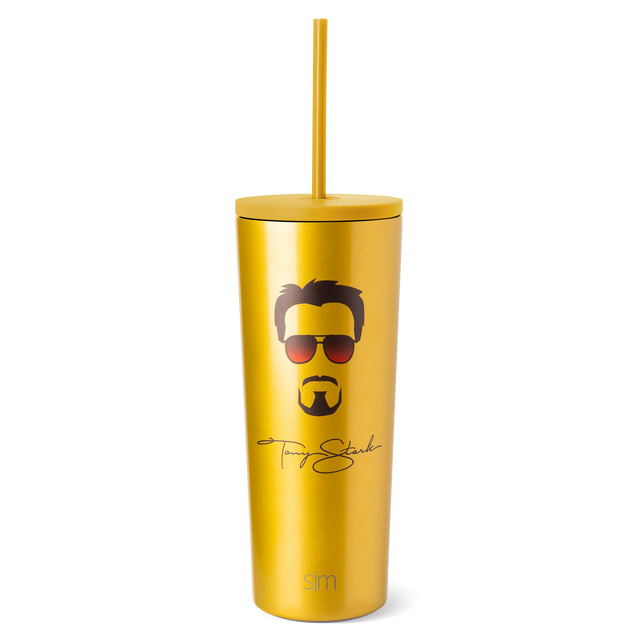 Golden yellow tumbler with matching straw, dark brown and black illustrated facial features Golden yellow tumbler with matching straw, dark brown and black illustrated facial features