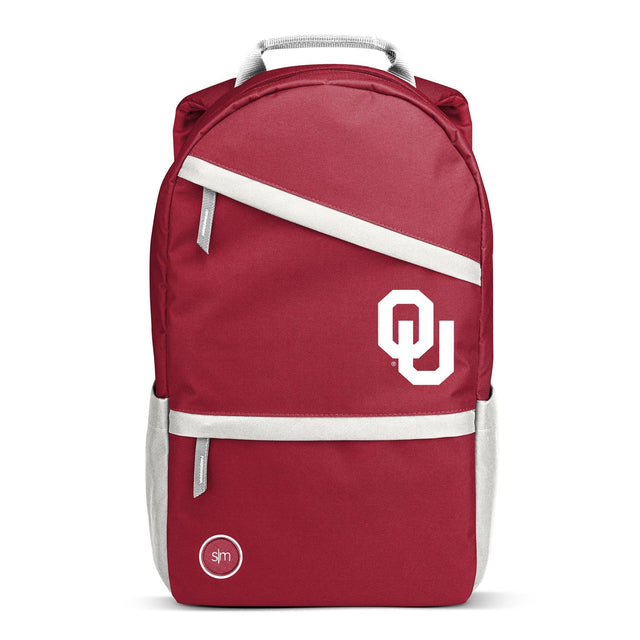 Crimson red backpack with cream-colored trim and handles Crimson red backpack with cream-colored trim and handles