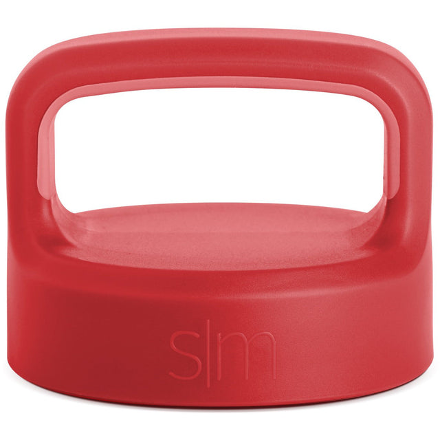 Coral-red product with handle, viewed from above showing consistent saturated color with subtle tonal variations across the exterior surface. Coral-red product with handle, viewed from above showing consistent saturated color with subtle tonal variations across the exterior surface.
