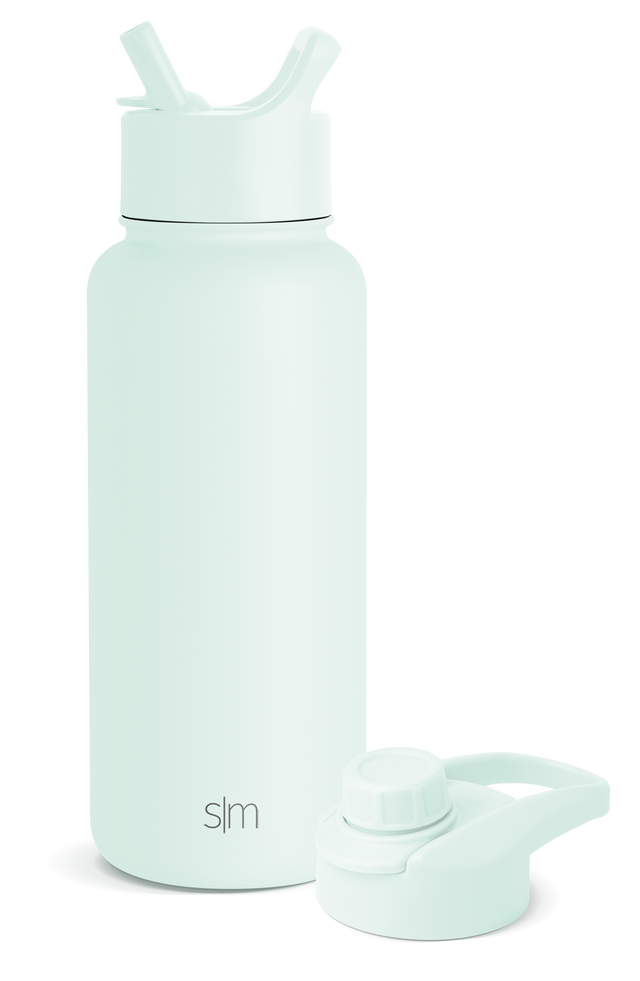 Pale mint green water bottle with detachable components on white background Pale mint green water bottle with detachable components on white background