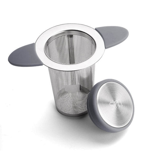 Stainless steel tea infuser with mesh basket and brushed metal components on white background Stainless steel tea infuser with mesh basket and brushed metal components on white background