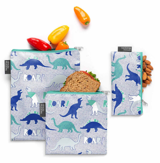 Dinosaur silhouettes in navy blue and teal on a white background with light gray accents in a cool-toned design Dinosaur silhouettes in navy blue and teal on a white background with light gray accents in a cool-toned design