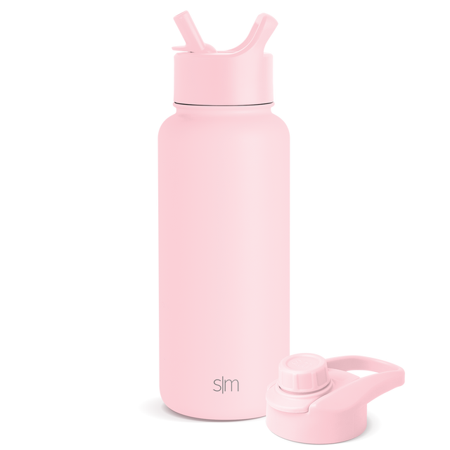 Soft pale pink product with accessories on white background