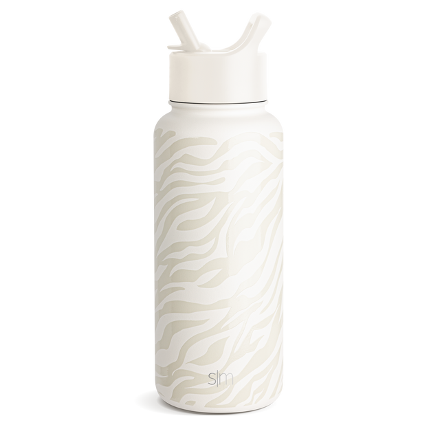 Cream-colored glass bottle with soft beige and tan striped decorative pattern on white background