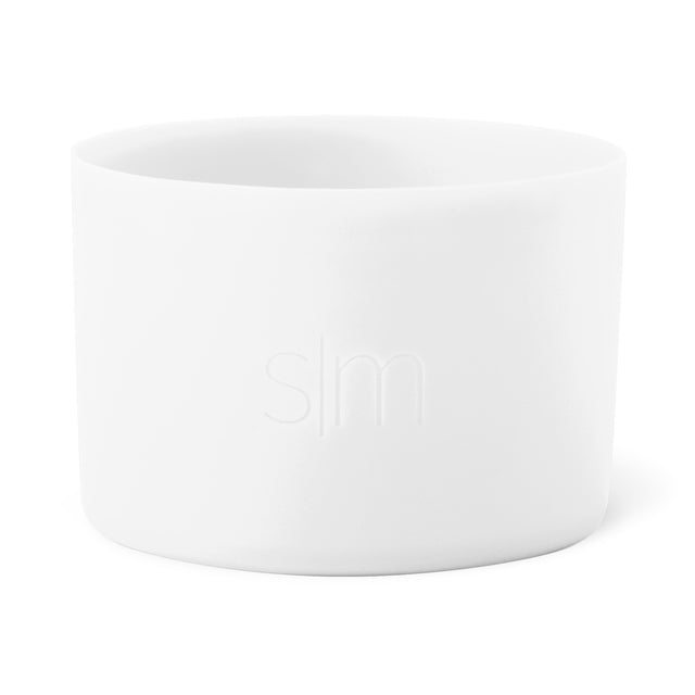 White boot with gray shadow details on off-white background