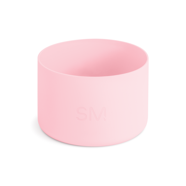 Pale pink cylindrical drinkware accessory on white background