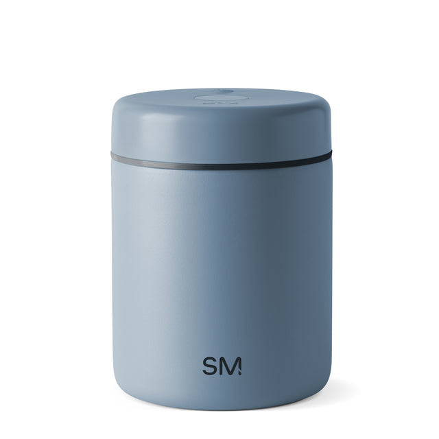 Soft blue-gray cylindrical product with subtle gradient, lighter shade on left side transitioning to deeper blue-gray tone on right side
