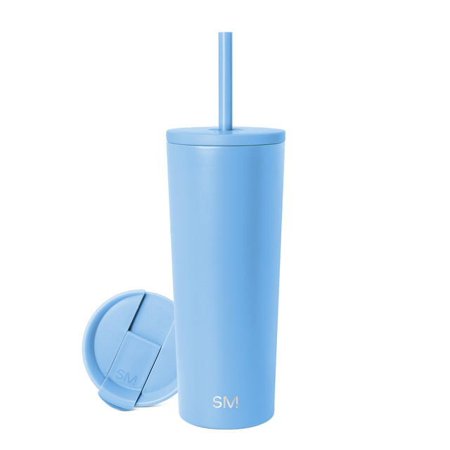 Periwinkle-blue reusable cup with matching lid and straw on white background