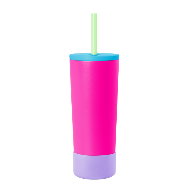 Tall cylindrical tumbler with straw featuring bold horizontal color bands in hot pink, set against white background