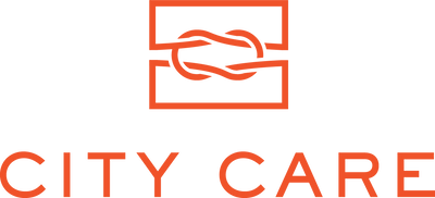 CityCare logo featuring stacked text in orange-red and black on white background, with primary mark above organization name.