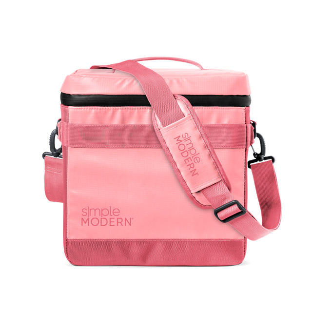 Pink and black minimalist design with soft pastel to coral tones, horizontal stripe detail, and metal hardware accents