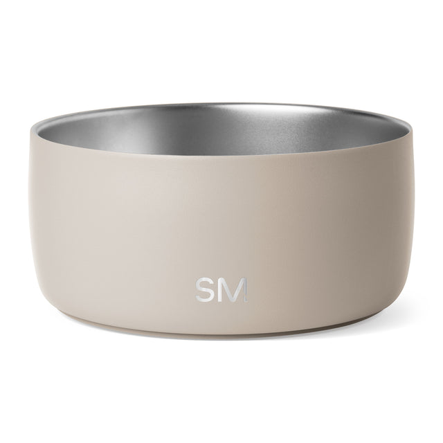 Beige ceramic bowl with soft cream exterior and brushed silver-gray metallic interior finish