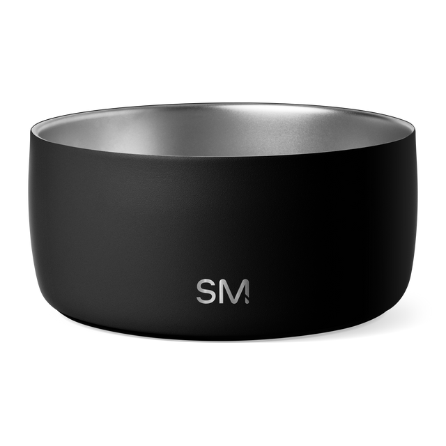 Black matte container with metallic silver interior rim and opening against dark background