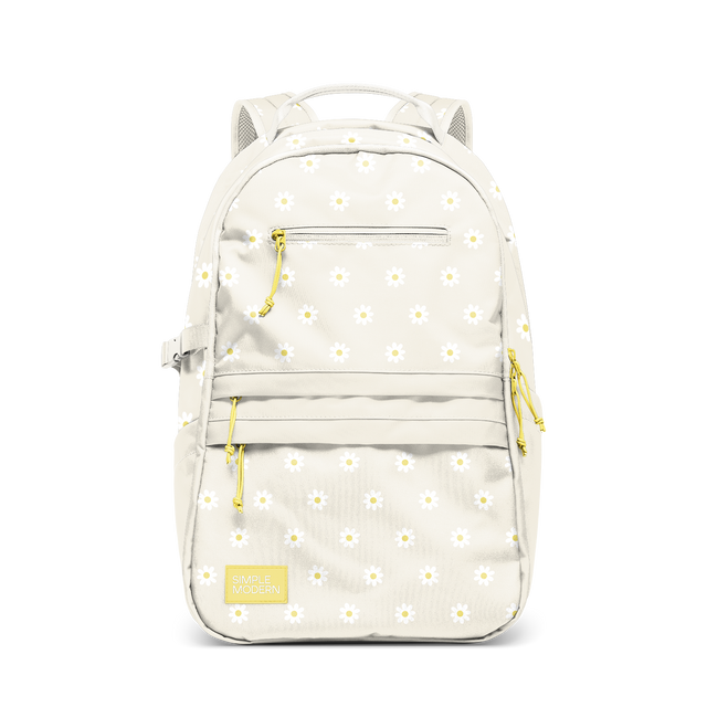 Cream-colored backpack with white daisy flower motifs and yellow centers scattered throughout, accented with bright yellow-gold details