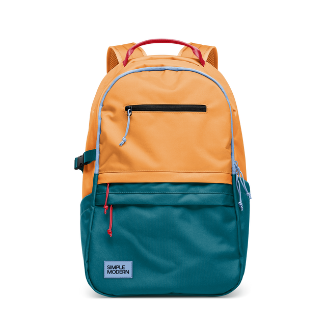 Two-tone backpack with bright peachy-orange upper section, teal-green lower section, and orange mesh shoulder straps.