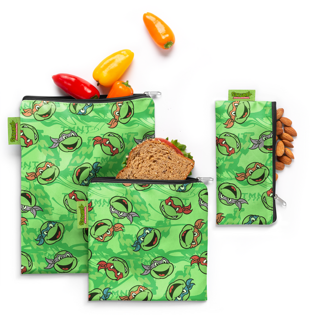 Bright lime green product with black outlines and red-orange cartoon character design accents