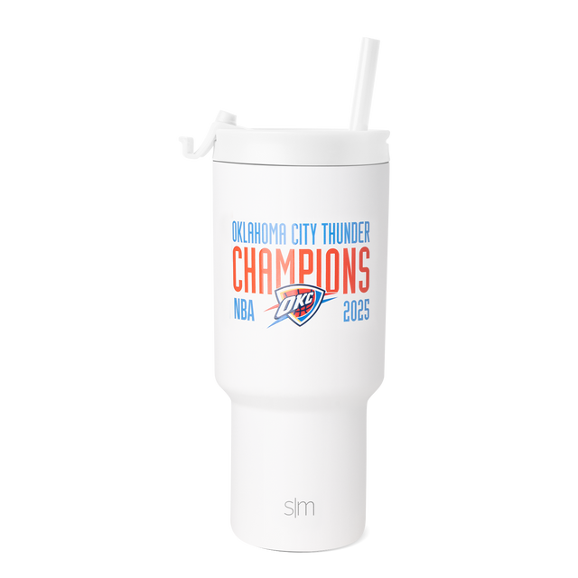 White tumbler with bright blue text reading 