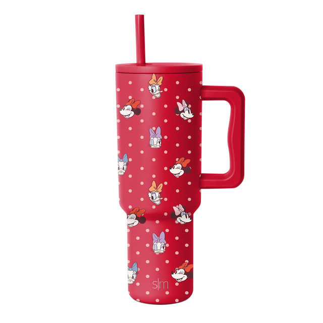 Red tumbler with white polka dots, matching red handle, lid, and straw