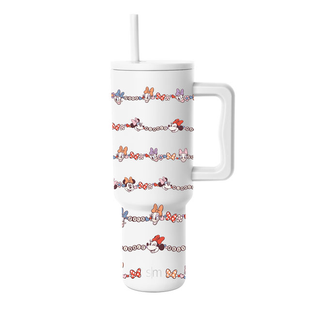 White tumbler with colorful decorative bands and character illustrations in coral orange, red, and purple accents