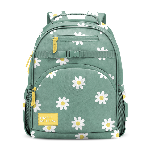 Sage green canvas backpack with white and pale yellow floral print, yellow zipper pulls, and mesh side pockets