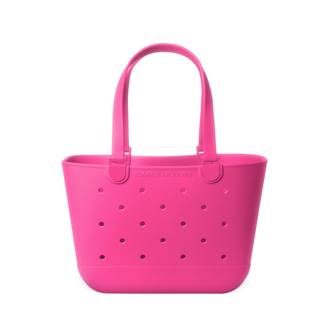Vibrant hot pink tote bag displayed against a white background
