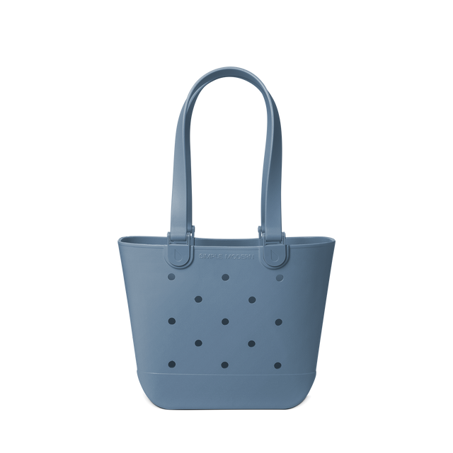Soft blue-grey muted tote bag on light neutral background