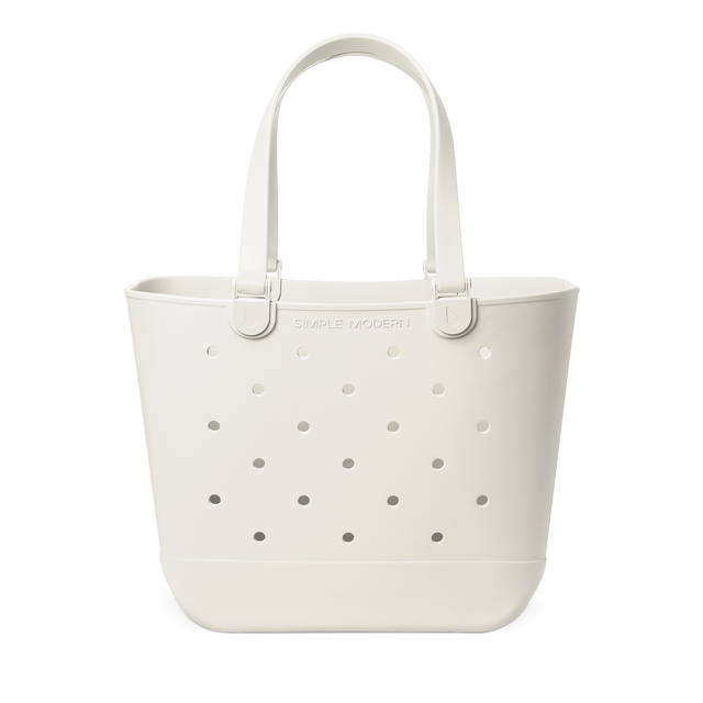 Cream-colored silicone tote bag with gray circular perforations pattern
