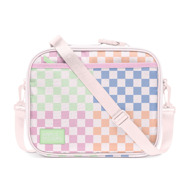 Pale pink and white checkerboard handbag with pastel color-blocked quadrants in soft green, dusty pink, and white patterns
