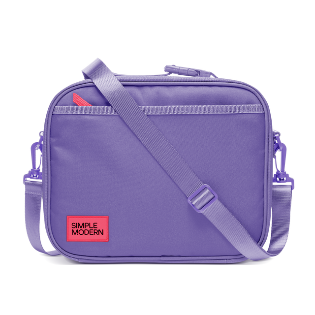 Purple backpack with light purple webbing straps and trim, featuring a bright neon red label detail