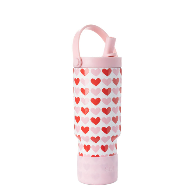 Cylindrical pink container with white and red heart pattern, pale pink lid and base, Valentine's themed decorative vessel